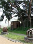 Čestmír Suška – prořezávané ocelové cisterny v zahradě za budovou muzea